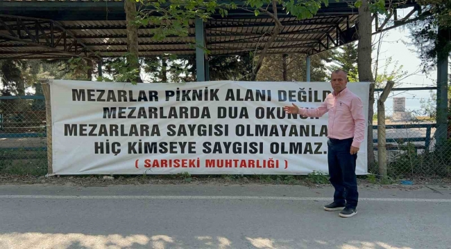 "Mezarlar piknik alanı değildir" diyen muhtar, mezarlıklarda pikniği yasakladı